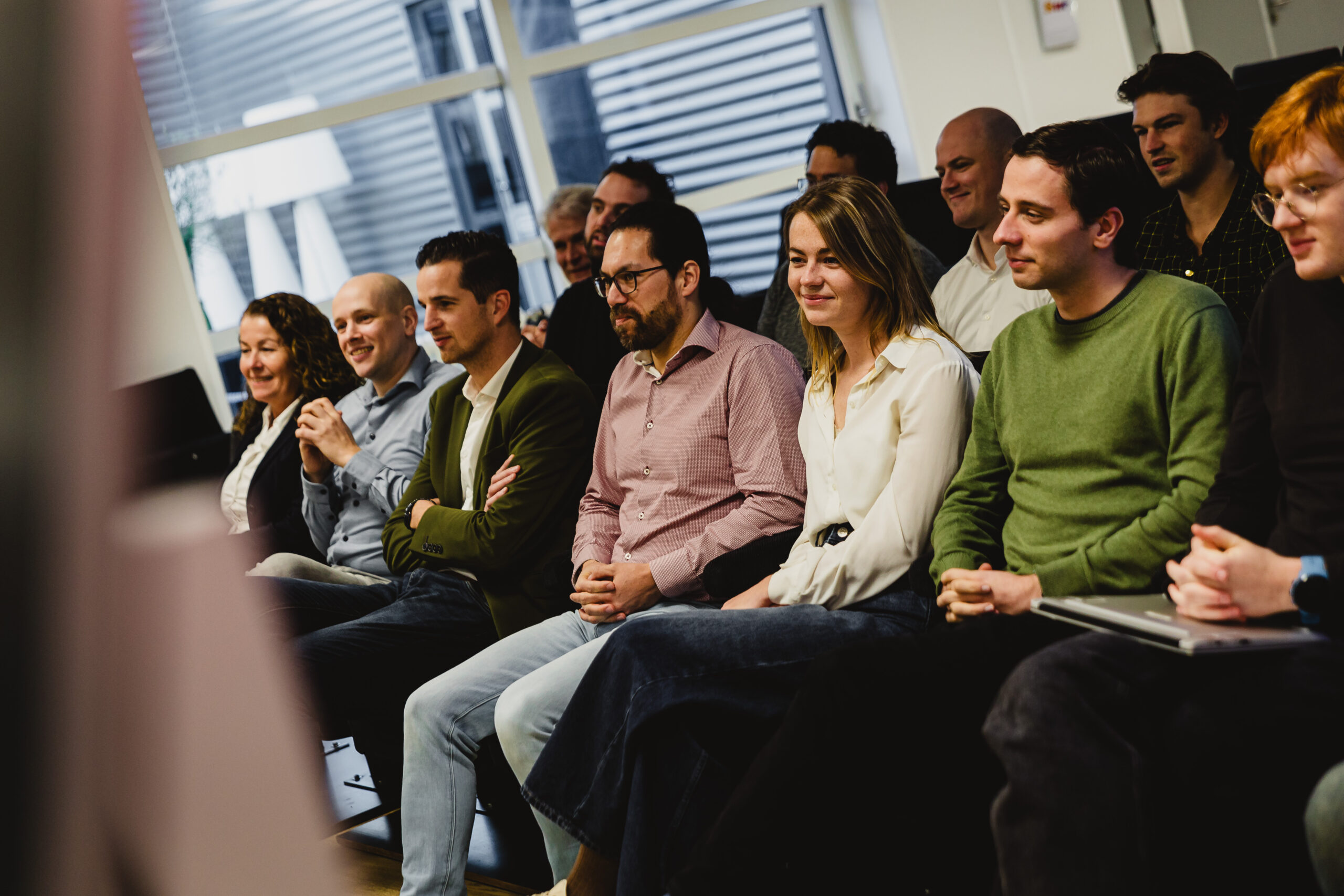 People sitting in the SUE theatre
